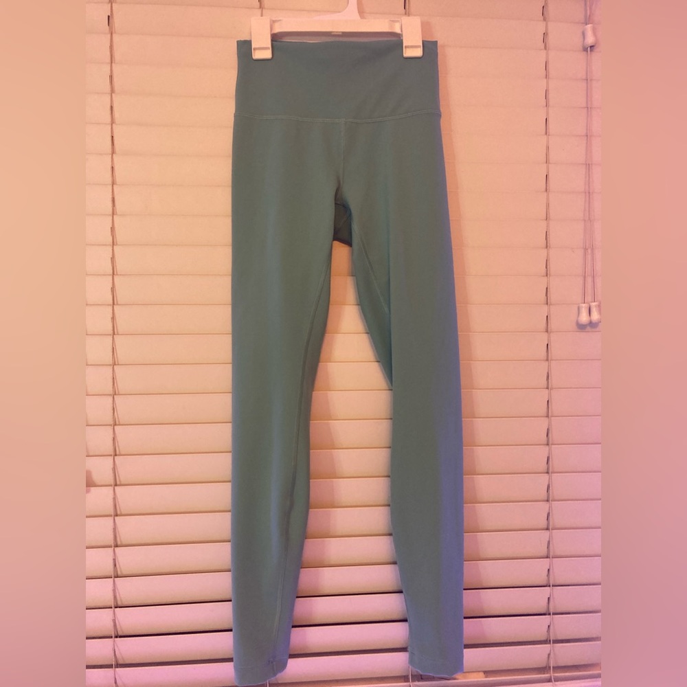 Lululemon Wunder Train High Rise Tight 28”, size 6, in the color Tidal Teal.